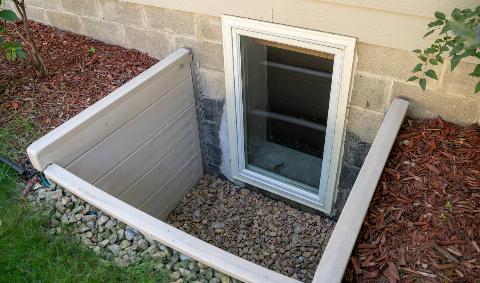 A deep basement window well.